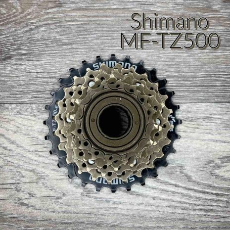 Тріскання Shimano TOURNEY MF-TZ500-6 6 швидкостей (без захисту)
